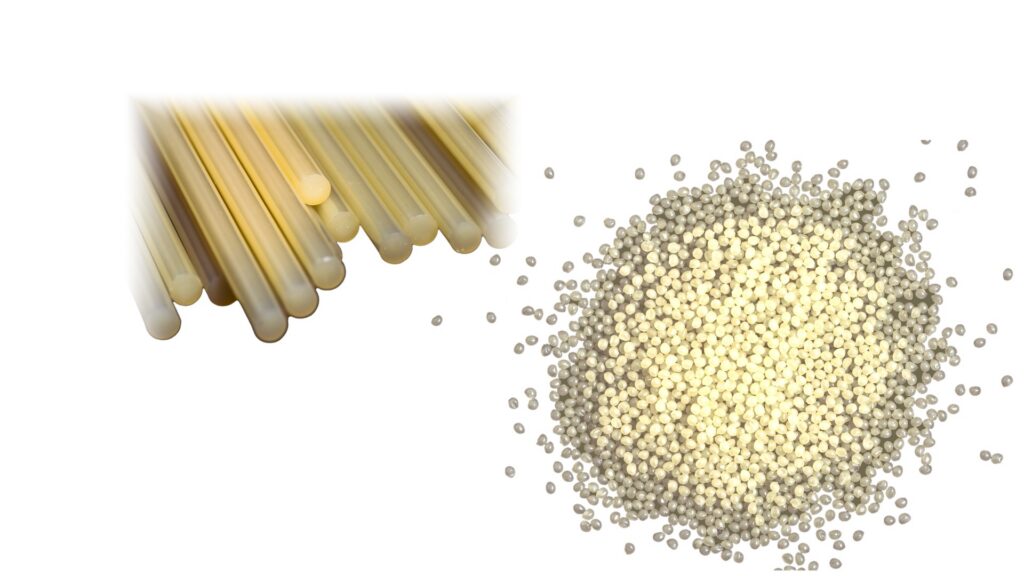 Barras y pellets de adhesivo Hot Melt sobre fondo blanco